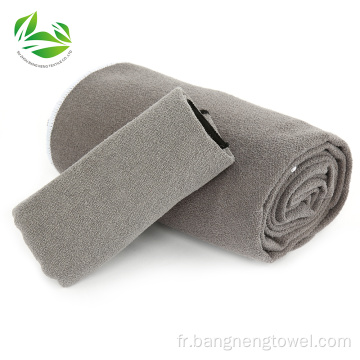 Serviette de yoga avec des poches d&#39;angle